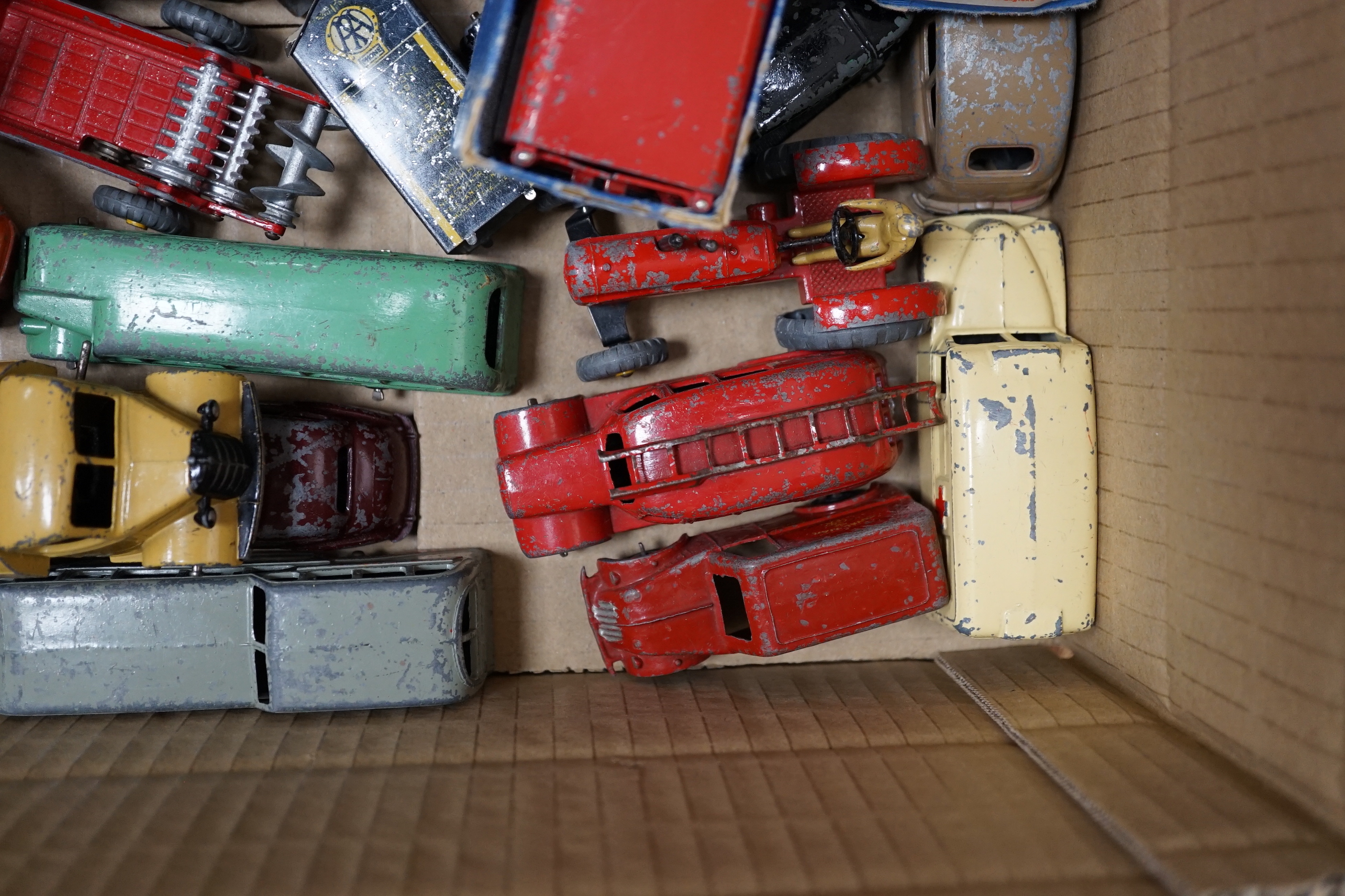 Twenty Dinky Toys and Supertoys including two Guy vans (514); Lyons and Slumberland, two taxis, a Vanguard, Daimler ambulance, Bedford refuse lorry, Guy Flatbed, M.G. Record car, etc. together with a quantity of assorted